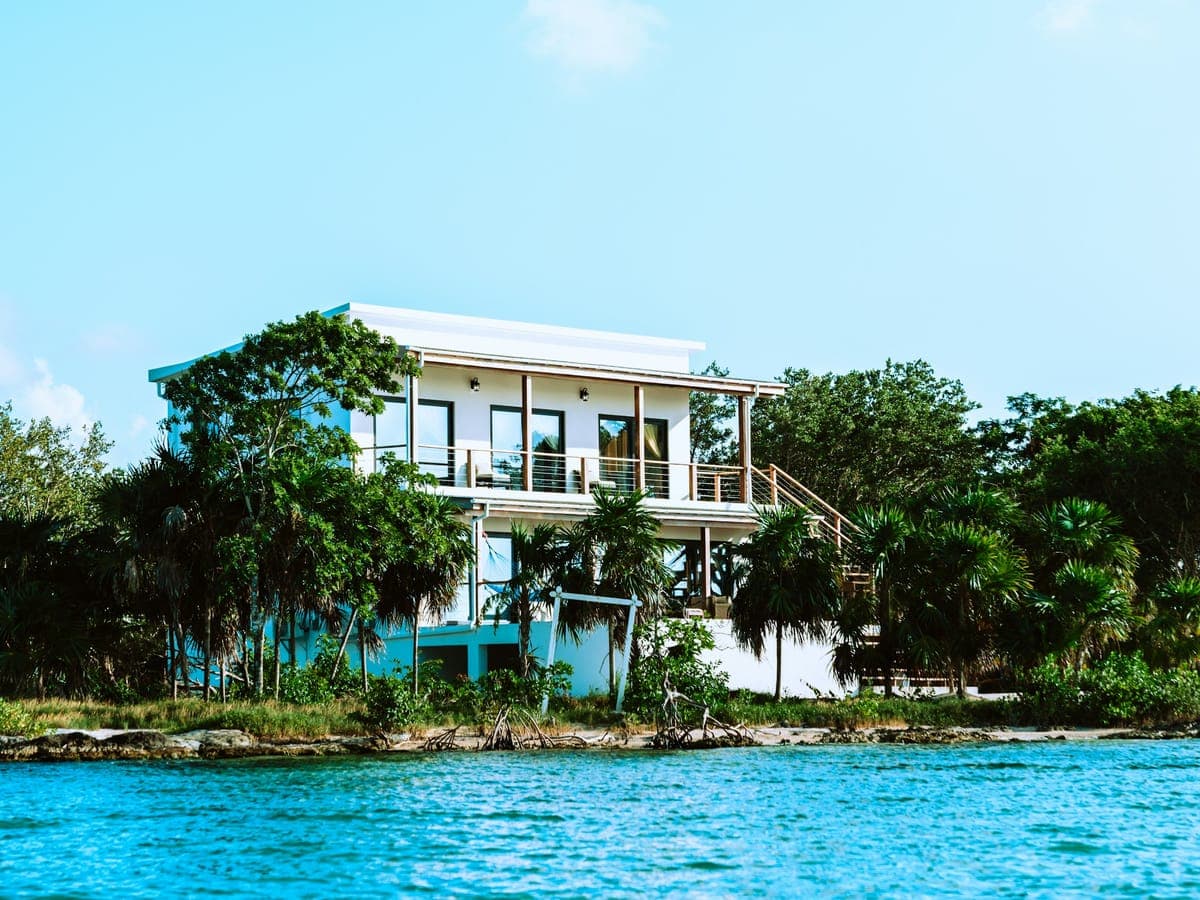 Blue Mahoe House from the water, cliff, garden, terrace above